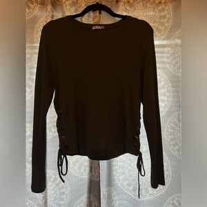 Black long sleeve, sides laced up